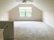 Spacious bonus room featuring a window and a ceiling fan for added comfort at 855 Gazebo Way # C, Greenwood, IN 46142