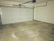 This garage features a white garage door at 855 Gazebo Way # C, Greenwood, IN 46142
