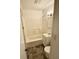 Clean bathroom with a tub-shower combo, vanity sink, and tile flooring at 910 Lonsvale Dr, Anderson, IN 46013