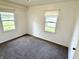 Bedroom with a window, offering an abundance of natural light and serene views at 910 Lonsvale Dr, Anderson, IN 46013