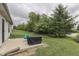 A simple backyard with a patio and lawn, ideal for outdoor activities and relaxation at 933 Curlew Ln, Greenwood, IN 46143