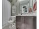 Nicely appointed bathroom features a shower-tub combo and modern vanity at 933 Curlew Ln, Greenwood, IN 46143