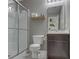 Well-maintained bathroom features walk-in shower and updated vanity with chrome faucet at 933 Curlew Ln, Greenwood, IN 46143