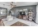 Comfortable living room with vaulted ceilings, ceiling fan, decor and a peek to dining room at 933 Curlew Ln, Greenwood, IN 46143