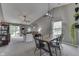 Inviting living room and dining area featuring neutral tones and a sliding glass door to the outdoors at 933 Curlew Ln, Greenwood, IN 46143