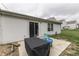 The backyard patio offers space for outdoor relaxation and a pleasant view of the grassy yard at 933 Curlew Ln, Greenwood, IN 46143