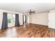 Large bedroom with multiple windows, wood-look flooring, and neutral paint at 9358 W Rising Sun Dr, Pendleton, IN 46064