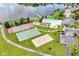 Aerial shot of community amenities including tennis, basketball, volleyball, swimming pool and recreation area at 9358 W Rising Sun Dr, Pendleton, IN 46064