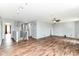 Open concept living room featuring wood-look floors at 9358 W Rising Sun Dr, Pendleton, IN 46064