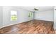Bright living room with scenic views from its large windows and nice flooring at 9358 W Rising Sun Dr, Pendleton, IN 46064