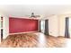 Spacious living room featuring laminate wood flooring and a ceiling fan at 9358 W Rising Sun Dr, Pendleton, IN 46064