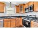 Bright kitchen showcasing granite countertops, stainless steel appliances, and ample cabinet space, ideal for culinary adventures at 9754 Bradford Knoll Dr, Fishers, IN 46037