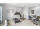 Home exercise room with various fitness machines and equipment on carpeted floor at , Brownsburg, IN 46112