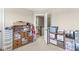 Open hallway with storage cabinets and a view of the staircase and upper level at , Brownsburg, IN 46112
