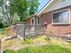 Backyard area showcasing a wooden deck perfect for outdoor gatherings and relaxation at 10307 Wilson Rd, Brownsburg, IN 46112