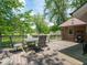 Inviting backyard deck area with seating arrangement, perfect for outdoor dining and social gatherings at 10307 Wilson Rd, Brownsburg, IN 46112