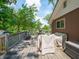 Backyard deck with outdoor furniture and grill covers, ideal for entertaining guests and enjoying summer barbecues at 10307 Wilson Rd, Brownsburg, IN 46112