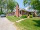 Charming exterior view of a home with a well-maintained lawn and landscaping at 10307 Wilson Rd, Brownsburg, IN 46112