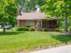 Charming single-story home featuring a cozy front porch and well-maintained lawn at 10307 Wilson Rd, Brownsburg, IN 46112