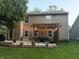 Charming backyard featuring a well-lit pergola, creating an ideal setting for outdoor enjoyment and gatherings at 110 Avon Ln, Noblesville, IN 46062