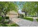 Charming one-story home with a well-manicured lawn and a two car garage, perfect for a Gathering at 110 Avon Ln, Noblesville, IN 46062