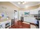 Well-lit kitchen with white cabinets, stainless steel appliances, and modern decor at 110 Avon Ln, Noblesville, IN 46062