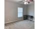 Neutral bedroom featuring a ceiling fan, a large window, and a desk for a calm and functional space at 1287 Highland Lake Way, Brownsburg, IN 46112