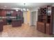 Spacious kitchen features cherry wood cabinets, stainless appliances, an island, and plenty of storage at 1287 Highland Lake Way, Brownsburg, IN 46112