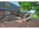 A backyard deck with hot tub and outdoor seating provides an excellent relaxation area at 12961 Limberlost Dr, Carmel, IN 46033