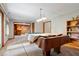 Spacious basement game room with pool table and built-in shelving, ideal for entertainment at 13297 Highland Springs Dr, McCordsville, IN 46055
