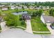 Aerial view of home and landscaping, including a large pond surrounded by residences at 1408 Snead Cir, Avon, IN 46123