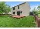 Expansive backyard featuring a cozy deck with well-kept lawn and a shed for outdoor storage at 1408 Snead Cir, Avon, IN 46123