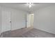Carpeted bedroom includes two entryways and ample closet space for versatile use and convenience at 1408 Snead Cir, Avon, IN 46123
