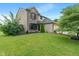 Lovely two-story home with a brick and vinyl exterior, a well-kept lawn, and an attached garage at 1408 Snead Cir, Avon, IN 46123