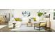 Comfortable living room with stylish decor, a cozy rug, and views of the outside at 15363 Alperton Rd, Fishers, IN 46037