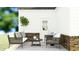 Cozy outdoor patio featuring modern furniture, a neutral rug, and elegant decorations for relaxation at 15363 Alperton Rd, Fishers, IN 46037