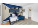 Modern bedroom with bunk beds and unique geometric paint design at 15387 Alperton Rd, Fishers, IN 46037