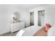This bedroom features a closet with sliding doors and a charming dresser at 15387 Alperton Rd, Fishers, IN 46037