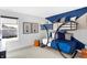 This bedroom has a bunk bed and ample natural light at 15387 Alperton Rd, Fishers, IN 46037