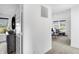 Upstairs hallway boasts neutral paint, carpet, and plenty of natural light at 15387 Alperton Rd, Fishers, IN 46037