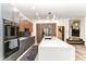 Bright kitchen with stainless steel appliances, center island, and ample counter space at 1620 W New York St, Indianapolis, IN 46222