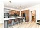 Modern kitchen with island, stainless steel appliances, and breakfast bar seating at 1620 W New York St, Indianapolis, IN 46222