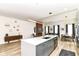Open-concept kitchen with large island, modern appliances, and seamless transition to living spaces at 1620 W New York St, Indianapolis, IN 46222