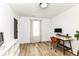 Bright office space with a desk, computer, and a large window providing natural light at 1620 W New York St, Indianapolis, IN 46222