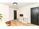 Open office space with modern furniture and black doors, offering functionality and style at 1620 W New York St, Indianapolis, IN 46222