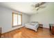 Bedroom featuring hardwood floors, lots of light, neutral walls and ceiling fan at 1633 W 200 North, Greenfield, IN 46140