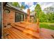 View of the expansive wood deck and sliding glass door that offers outdoor living and entertaining space at 1633 W 200 North, Greenfield, IN 46140