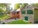 Beautiful exterior showcasing brick and shingles and a large deck at 1633 W 200 North, Greenfield, IN 46140