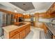 Spacious kitchen featuring stainless steel appliances, island, and granite countertops at 1633 W 200 North, Greenfield, IN 46140