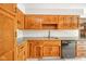 Kitchen featuring granite counters, stainless steel sink and oak cabinets at 1633 W 200 North, Greenfield, IN 46140